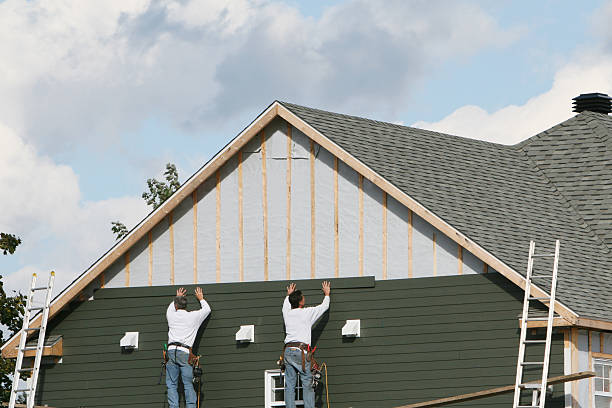 Professional Siding technician working in Huntsville, TN